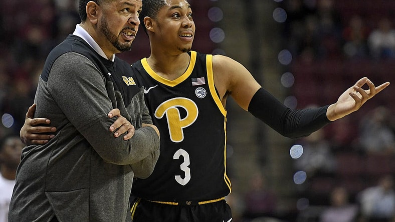 Feb 11, 2023; Tallahassee, Florida, USA; Pittsburgh Panthers guard Greg Elliott (3) speaks with head coach Jeff Capel during the first half against the Florida State Seminoles at Donald L. Tucker Center. Mandatory Credit: Melina Myers-USA TODAY Sports