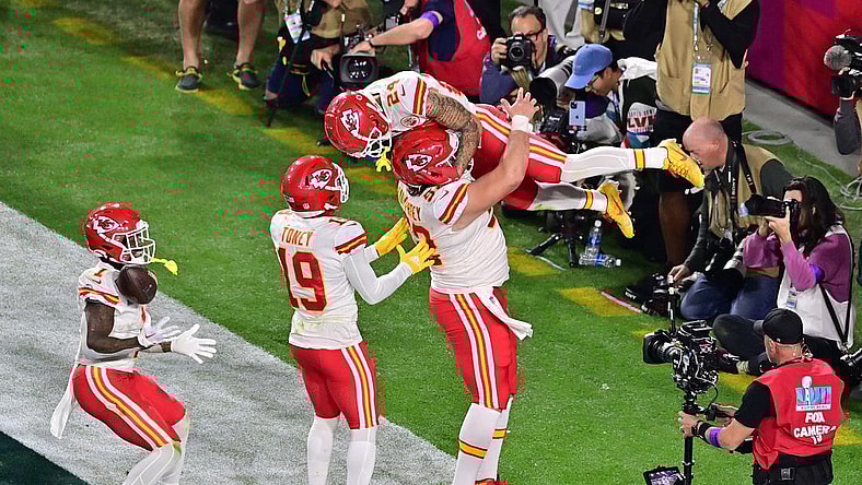 Feb 12, 2023; Glendale, Arizona, US; Kansas City Chiefs wide receiver Skyy Moore (24) celebrates with center Creed Humphrey (52) and wide receiver Kadarius Toney (19) and running back Jerick McKinnon (1) after scoring a touchdown against the Philadelphia Eagles during the fourth quarter of Super Bowl LVII at State Farm Stadium. Mandatory Credit: Matt Kartozian-USA TODAY Sports
