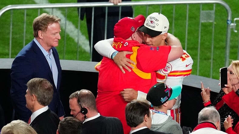 Kansas City Chiefs head coach Andy Reid hugs quarterback Patrick Mahomes (15) after defeating the Philadelphia Eagles as NFL commissioner Roger Goodell looks on in Super Bowl LVII at State Farm Stadium in Glendale on Feb. 12, 2023.

Nfl Super Bowl Lvii Kansas City Chiefs Vs Philadelphia Eagles