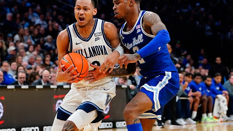 Feb 11, 2023; Philadelphia, Pennsylvania, USA; Villanova Wildcats guard Mark Armstrong (2) drives the ball against Seton Hall Pirates guard Al-Amir Dawes (2) during the second half at Wells Fargo Center. Mandatory Credit: Gregory Fisher-USA TODAY Sports