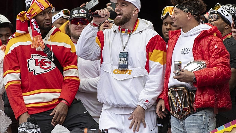 Feb 15, 2023; Kansas City, MO, USA; Kansas City Chiefs tight end Travis Kelce makes a speech at the Super Bowl LVII Champions Parade in downtown Kansas City, Mo. Mandatory Credit: Amy Kontras-USA TODAY Sports