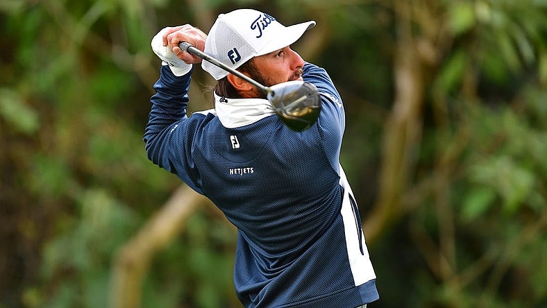 Feb 16, 2023; Pacific Palisades, California, USA; Max Homa hits from the twelfth hole tee during the first round of The Genesis Invitational golf tournament. Mandatory Credit: Gary A. Vasquez-USA TODAY Sports