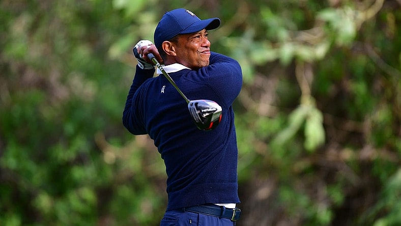 Feb 16, 2023; Pacific Palisades, California, USA; Tiger Woods hits from the twelfth hole tee during the first round of The Genesis Invitational golf tournament. Mandatory Credit: Gary A. Vasquez-USA TODAY Sports