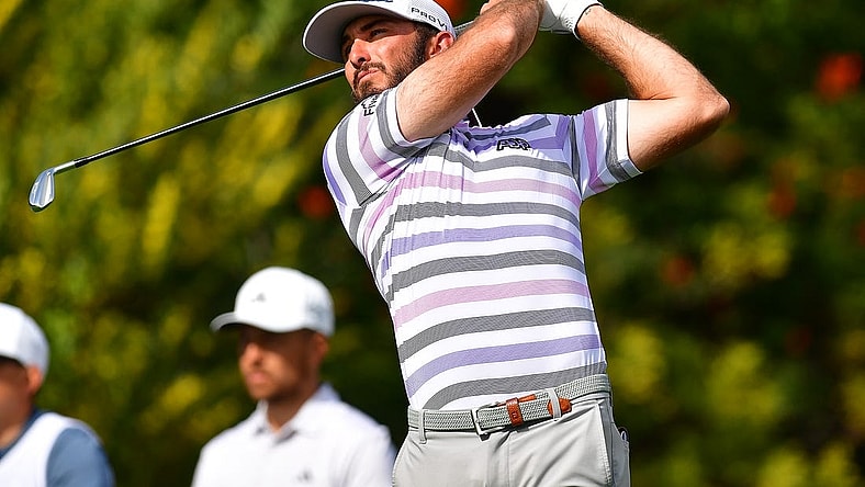 Feb 17, 2023; Pacific Palisades, California, USA; Max Homa hits from the fourth hole tee during the second round of The Genesis Invitational golf tournament. Mandatory Credit: Gary A. Vasquez-USA TODAY Sports