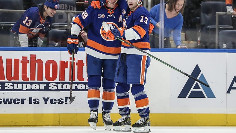 Feb 17, 2023; Elmont, New York, USA;  New York Islanders center Brock Nelson (29) celebrates with center Mathew Barzal (13) after scoring a goal in the second period against the Pittsburgh Penguins at UBS Arena. Mandatory Credit: Wendell Cruz-USA TODAY Sports