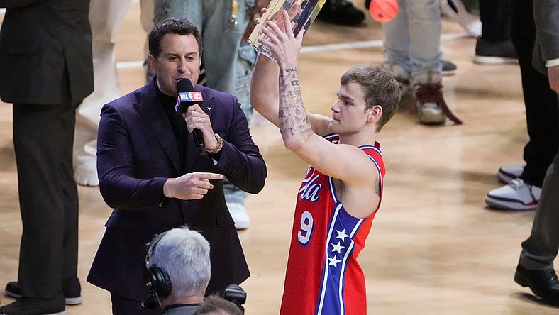 Feb 18, 2023; Salt Lake City, UT, USA; Philadelphia 76ers guard Mac McClung (9) reacts after winning the Dunk Contest during the 2023 All Star Saturday Night at Vivint Arena. Mandatory Credit: Kirby Lee-USA TODAY Sports