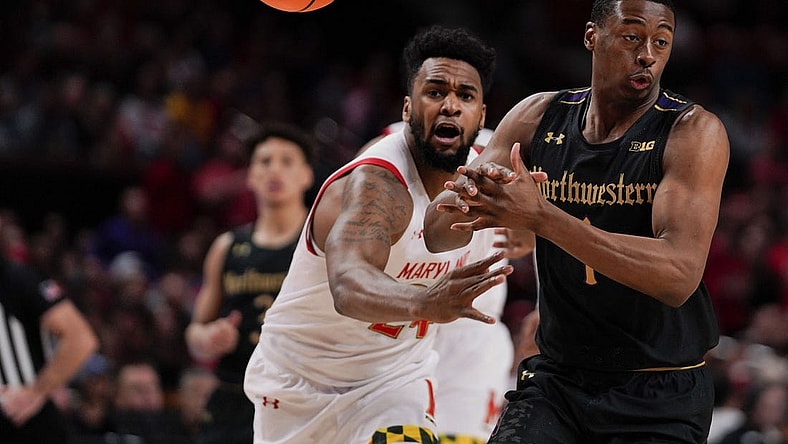 Feb 26, 2023; College Park, Maryland, USA; Maryland Terrapins forward Donta Scott (24) knocks the ball out of the hands of Northwestern Wildcats guard Chase Audige (1) in the first half at Xfinity Center. Mandatory Credit: Brent Skeen-USA TODAY Sports