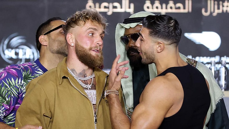 Jake Paul and Tommy Fury clash as Derek Chisora and Jake Paul's manager Nakisa Bidarian intervene during the press conference in Riyadh, Saudi Arabia on Feb. 23, 2023.