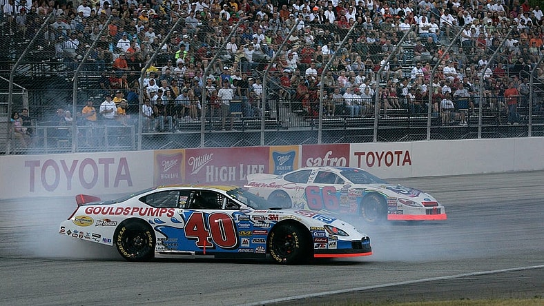 Car number 40 driven by Scott Lagasse Jr. goes sideways on turn 4 on lap 22 after car number 66 driven by Aaron Fike lost control on turn 4 during the Nascar Busch series SBC 250 at the Milwaukee Mile in West Allis Saturday, June 25, 2005. (Photo by David Joles)

Race26 Race26sptjoles2 Of Sev