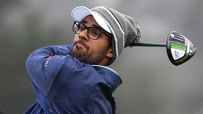 Feb 13, 2021; Pebble Beach, California, USA; Akshay Bhatia plays his shot from the first tee during the third round of the AT&T Pebble Beach Pro-Am golf tournament at Pebble Beach Golf Links. Mandatory Credit: Orlando Ramirez-USA TODAY Sports