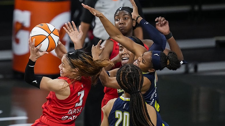 May 27, 2021; College Park, Georgia, USA; Atlanta Dream guard Chennedy Carter (3) comes away with a rebound against the Dallas Wings during the second half at Gateway Center Arena at College Park. Mandatory Credit: Dale Zanine-USA TODAY Sports