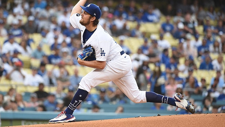 Jun 28, 2021; Los Angeles, California, USA;  Los Angeles Dodgers starting pitcher Trevor Bauer (27) pitches against the San Francisco Giants in the first inning at Dodger Stadium. Mandatory Credit: Richard Mackson-USA TODAY Sports