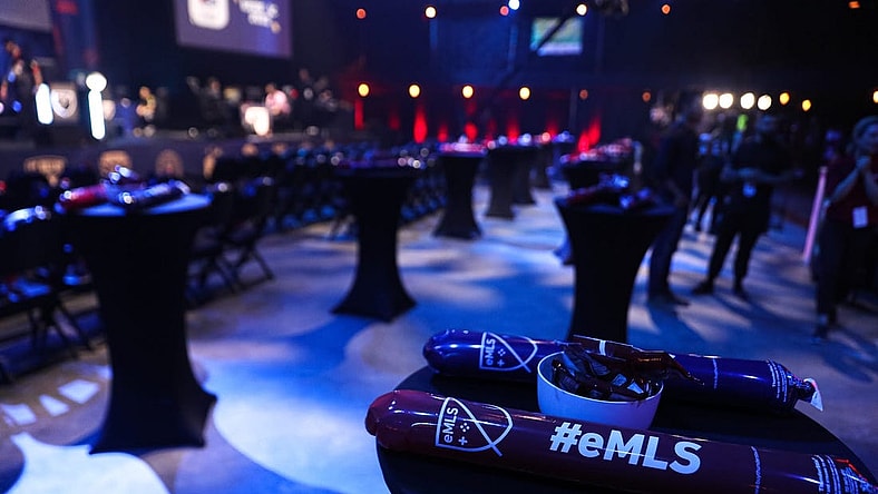 Thunder sticks are placed on chairs and tables for fans. The eMLS Cup tournament was held in-person at the Moody Theater on March 13, 2022. The eMLS Cup is the championship tournament that determines which player is the best FIFA player in North America.

Aem Sxsw Emls Cup 2