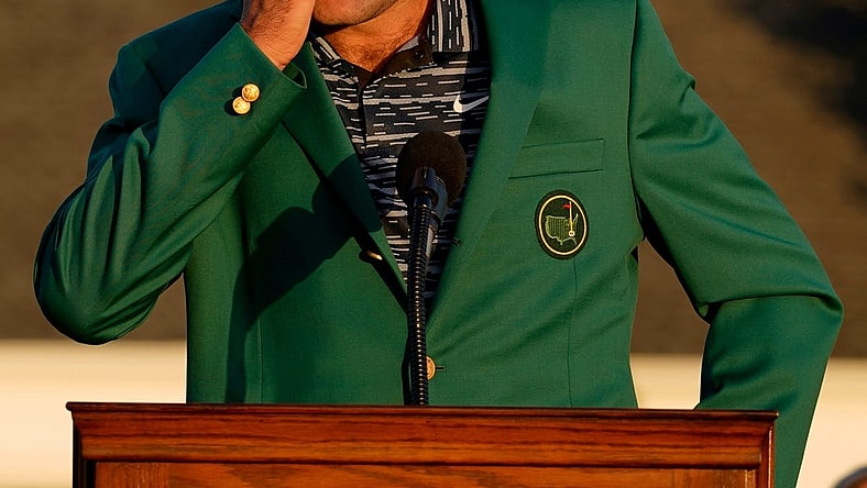 Scottie Scheffler reacts at the podium while wearing the green jacket during the final round of the Masters.
Usp Golf Masters Tournament Final Round S Glf Usa Ga