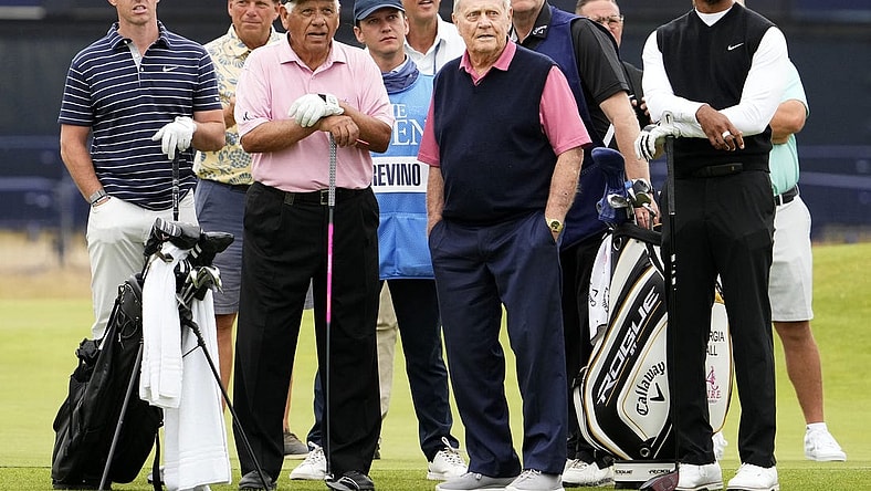 Jul 11, 2022; St. Andrews, SCT; Rory McIlroy, Lee Trevino, Jack Nicklaus, and Tiger Woods during the R&A Celebration of Champions four-hole challenge at the 150th Open Championship golf tournament at St. Andrews Old Course. Mandatory Credit: Rob Schumacher-USA TODAY Sports