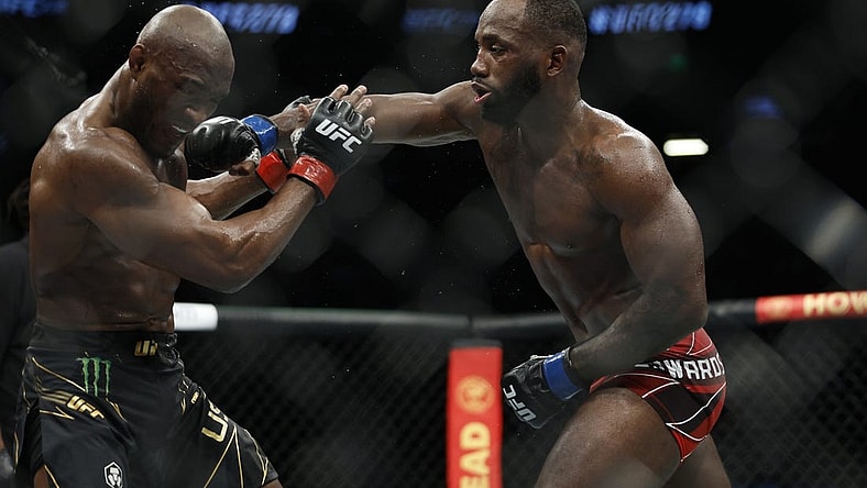 Aug 20, 2022; Salt Lake City, Utah, USA; Kamaru Usman (red gloves) fights Leon Edwards (blue gloves) during UFC 278 at Vivint Arena. Mandatory Credit: Jeffrey Swinger-USA TODAY Sports