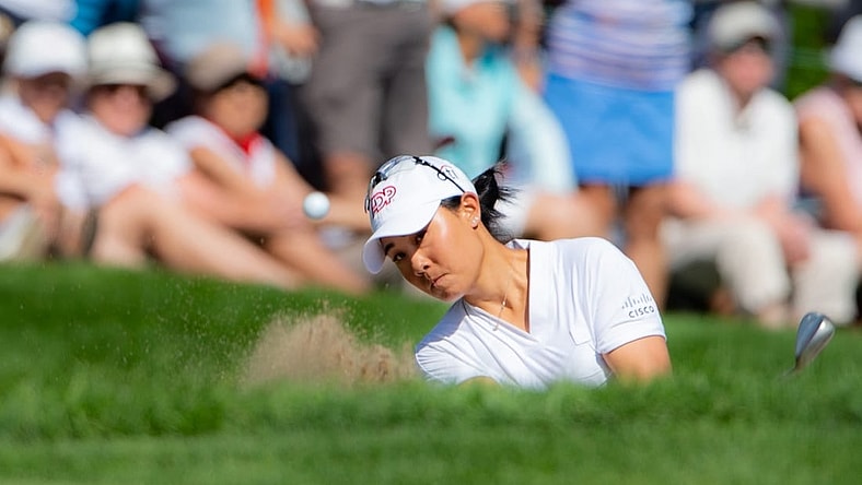 Aug 28, 2022; Ottawa, Ontario, CAN; Danielle Kang from the United States plays from the bunker on the 18th hole in the final round of the CP Women's Open golf tournament. Mandatory Credit: Marc DesRosiers-USA TODAY Sports
