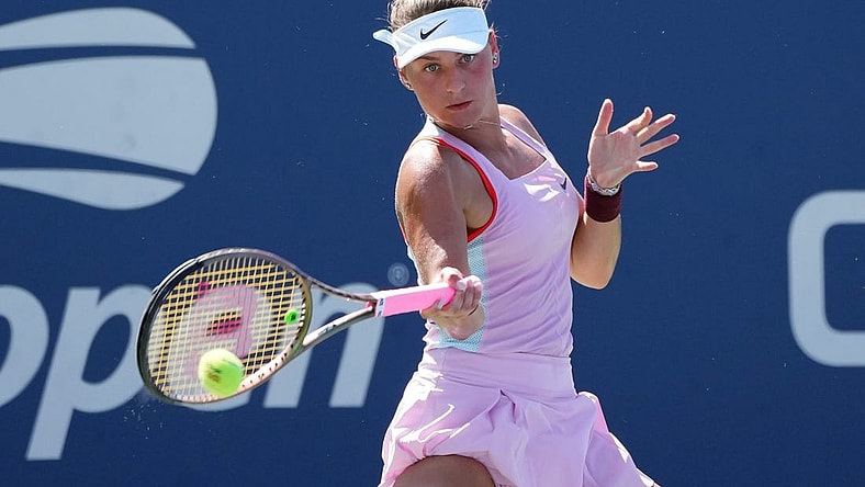 Sep 1, 2022; Flushing, NY, USA; Marta Kostyuk of Ukraine hits a shot against Victoria Azarenka on day four of the 2022 U.S. Open tennis tournament at USTA Billie Jean King Tennis Center. Mandatory Credit: Jerry Lai-USA TODAY Sports
