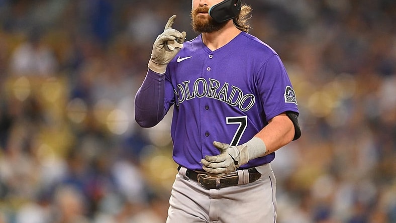Oct 4, 2022; Los Angeles, California, USA;  Colorado Rockies second baseman Brendan Rodgers (7) crosses the plate after a solo home run in the first inning off Los Angeles Dodgers starting pitcher Julio Urias (7) at Dodger Stadium. Mandatory Credit: Jayne Kamin-Oncea-USA TODAY Sports