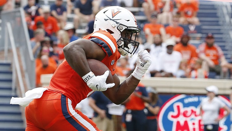 Sep 3, 2022; Charlottesville, Virginia, USA; Virginia Cavaliers running back Mike Hollins (7) carries the ball during the first half against the Richmond Spiders at Scott Stadium. Mandatory Credit: Amber Searls-USA TODAY Sports