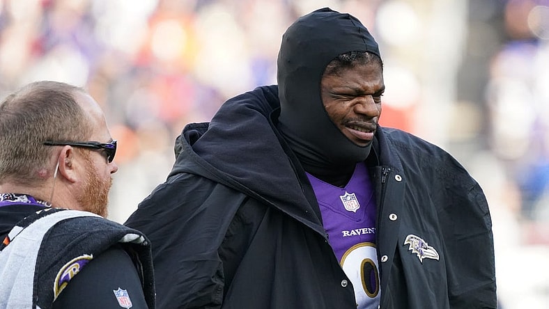 Dec 4, 2022; Baltimore, Maryland, USA; Baltimore Ravens quarterback Lamar Jackson (8) reacts on the sideline in the second quarter after being sacked against the Denver Broncos at M&T Bank Stadium. Mandatory Credit: Mitch Stringer-USA TODAY Sports