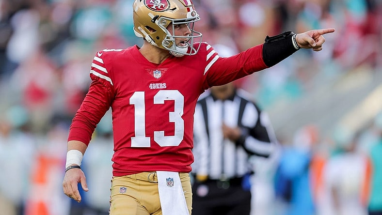 Dec 4, 2022; Santa Clara, California, USA; San Francisco 49ers quarterback Brock Purdy (13) celebrates after throwing a touchdown pass during the second quarter against the Miami Dolphins at Levi's Stadium. Mandatory Credit: Sergio Estrada-USA TODAY Sports