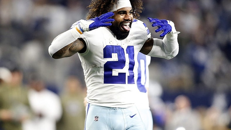 Dec 4, 2022; Arlington, Texas, USA;  Dallas Cowboys running back Ezekiel Elliott (21) celebrates a touchdown in the fourth quarter against the Indianapolis Colts at AT&T Stadium. Mandatory Credit: Tim Heitman-USA TODAY Sports