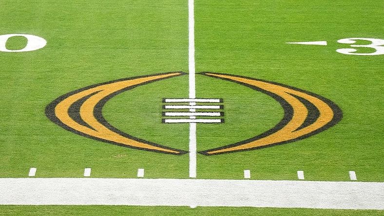 Dec 30, 2022; Glendale AZ, USA; The College Football Playoff logo on the field at State Farm Stadium, the site of the 2022 CFP Semifinal between the TCU Horned Frogs and the Michigan Wolverines and Super Bowl 57 (LVII). Mandatory Credit: Kirby Lee-USA TODAY Sports