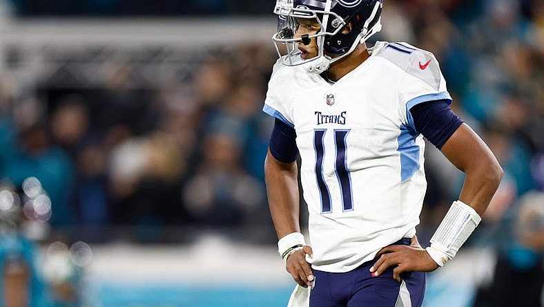 Jan 7, 2023;  Jacksonville, Florida, USA; Tennessee Titans quarterback Joshua Dobbs (11) reacts after giving up a fumble for a touchdown to Jacksonville Jaguars linebacker Josh Allen (41) during the fourth quarter at TIAA Bank Field. Mandatory Credit: Douglas DeFelice-USA TODAY Sports