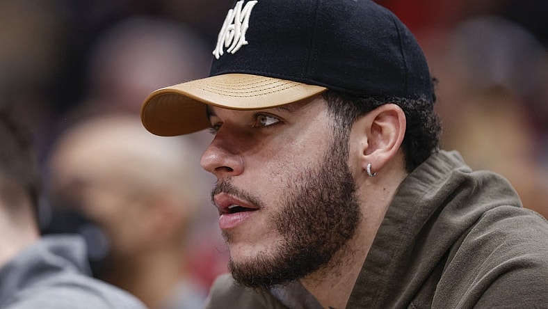 Jan 13, 2023; Chicago, Illinois, USA; Injured Chicago Bulls guard Lonzo Ball sits on the bench during the first half against the Oklahoma City Thunder at United Center. Mandatory Credit: Kamil Krzaczynski-USA TODAY Sports
