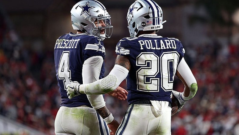 Jan 16, 2023; Tampa, Florida, USA; Dallas Cowboys running back Tony Pollard (20) reacts with quarterback Dak Prescott (4) after a touchdown against the Tampa Bay Buccaneers in the first half during the wild card game at Raymond James Stadium. Mandatory Credit: Nathan Ray Seebeck-USA TODAY Sports
