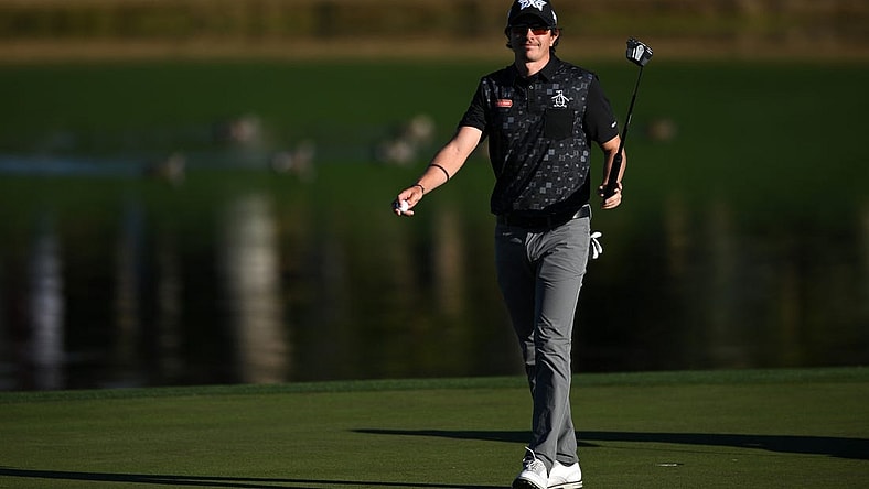 Jan 21, 2023; La Quinta, California, USA; Nico Echavarria acknowledges the crowd after a putt on the ninth green during the third round of The American Express golf tournament at Pete Dye Stadium Course. Mandatory Credit: Orlando Ramirez-USA TODAY Sports
