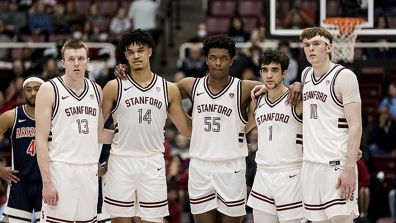 Feb 11, 2023; Stanford, California, USA; Stanford Cardinal guard Michael Jones (13) and forward Spencer Jones (14) and forward Harrison Ingram (55) and guard Isa Silva (1) and forward Max Murrell (10) watch a free-throw by Arizona Wildcats center Oumar Ballo (not seen) during the second half at Maples Pavilion. Mandatory Credit: John Hefti-USA TODAY Sports