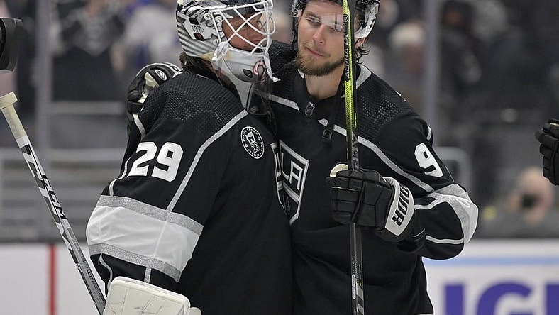 Feb 11, 2023; Los Angeles, California, USA;  Los Angeles Kings goaltender Pheonix Copley (29) is congratulated by Los Angeles Kings right wing Adrian Kempe (9) after a shutout against the Pittsburgh Penguins at Crypto.com Arena. Kempe scored four goals in the game as the first player in Kings franchise history to accomplish that record. Mandatory Credit: Jayne Kamin-Oncea-USA TODAY Sports