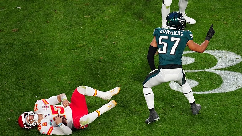 Kansas City Chiefs quarterback Patrick Mahomes (15) lies on the turf after being tackled by Philadelphia Eagles linebacker T.J. Edwards (57) during the second quarter in Super Bowl LVII at State Farm Stadium in Glendale on Feb. 12, 2023.

Nfl Super Bowl Lvii Kansas City Chiefs Vs Philadelphia Eagles