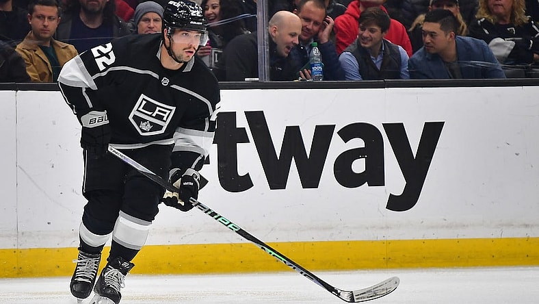 Feb 13, 2023; Los Angeles, California, USA; Los Angeles Kings left wing Kevin Fiala (22) controls the puck against the Buffalo Sabres during the second period at Crypto.com Arena. Mandatory Credit: Gary A. Vasquez-USA TODAY Sports