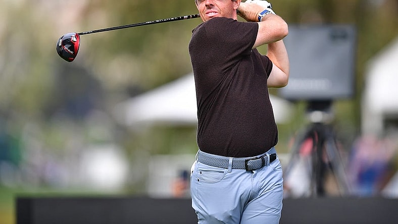 Feb 18, 2023; Pacific Palisades, California, USA; Rory McIlroy hits from the fifteenth hole tee during the third round of The Genesis Invitational golf tournament. Mandatory Credit: Gary A. Vasquez-USA TODAY Sports