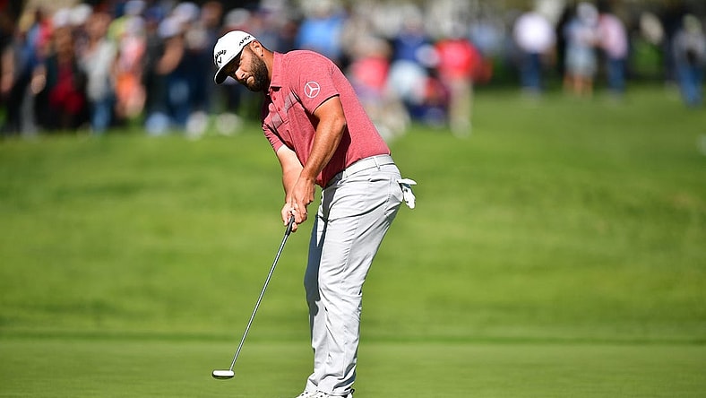 Feb 19, 2023; Pacific Palisades, California, USA; Jon Rahm putts on thirteenth green during the final round of The Genesis Invitational golf tournament. Mandatory Credit: Gary A. Vasquez-USA TODAY Sports