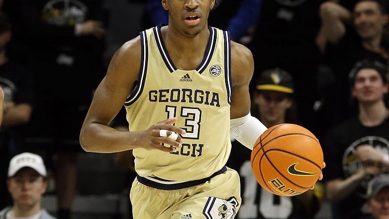 Feb 21, 2023; Pittsburgh, Pennsylvania, USA;  Georgia Tech Yellow Jackets guard Miles Kelly (13) brings the ball up court against the Pittsburgh Panthers during the first half at the Petersen Events Center. Mandatory Credit: Charles LeClaire-USA TODAY Sports
