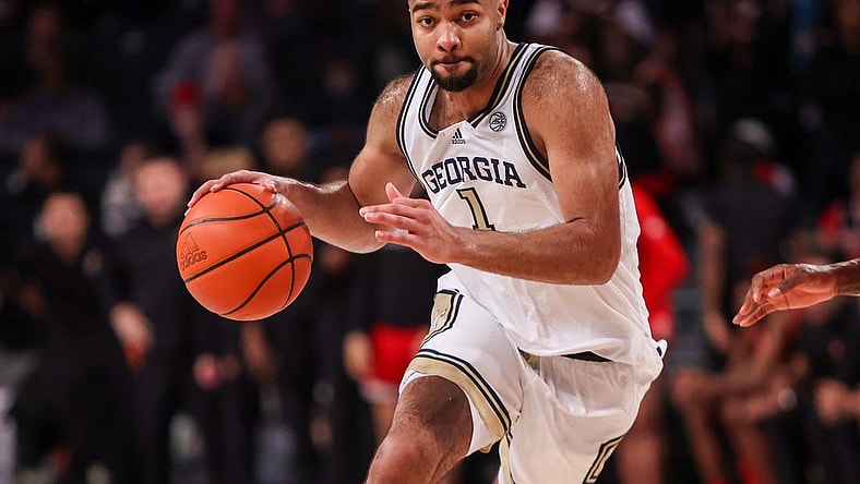 Feb 25, 2023; Atlanta, Georgia, USA; Georgia Tech Yellow Jackets guard Kyle Sturdivant (1) drives to the basket against the Louisville Cardinals in the second half at McCamish Pavilion. Mandatory Credit: Brett Davis-USA TODAY Sports