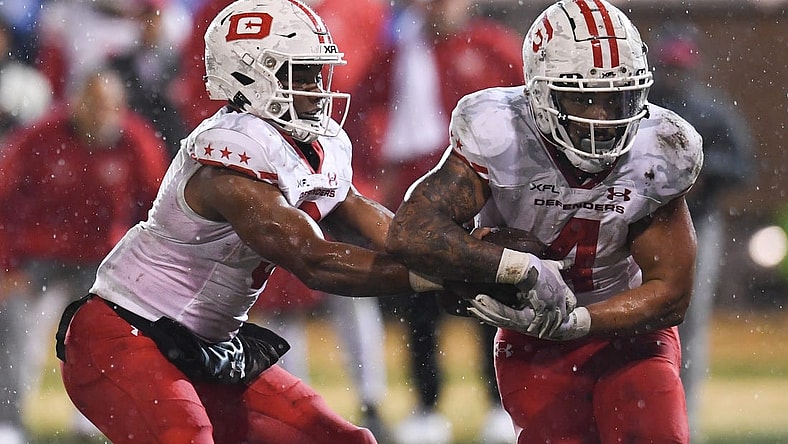Feb 25, 2023; Las Vegas, NV, USA; D.C. Defenders quarterback D'Eriq King (3) hands the ball off to running back Abram Smith (4) against the Vegas Vipers in the fourth quarter at Cashman Field. Mandatory Credit: Candice Ward-USA TODAY Sports