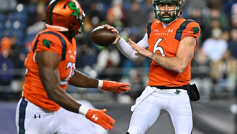 Feb 23, 2023; Seattle, WA, USA; Seattle Sea Dragons quarterback Ben DiNucci (6) and Seattle Sea Dragons running back Morgan Ellison (25) during the second half at Lumen Field. St. Louis defeated Seattle 20-18. Mandatory Credit: Steven Bisig-USA TODAY Sports