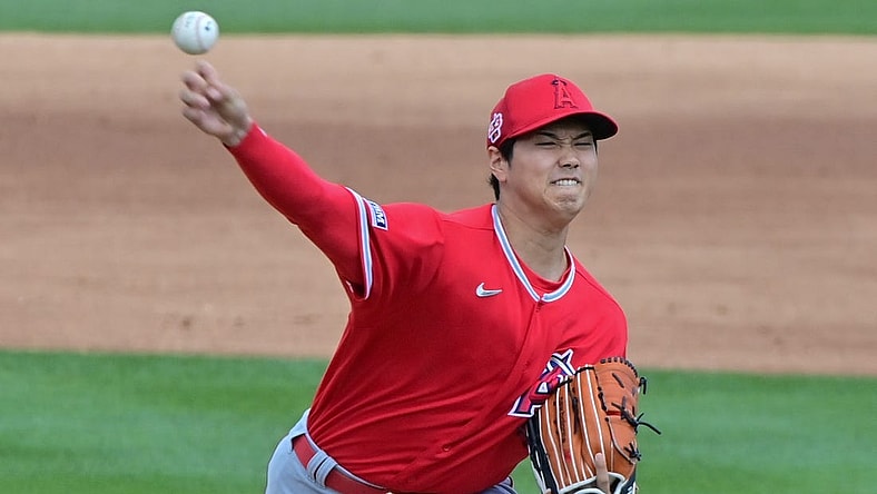 Feb 28, 2023; Mesa, Arizona, USA; Los Angeles Angels starting pitcher Shohei Ohtani (17) throws in the second inning against the Oakland Athletics during a Spring Training game at Hohokam Stadium. Mandatory Credit: Matt Kartozian-USA TODAY Sports