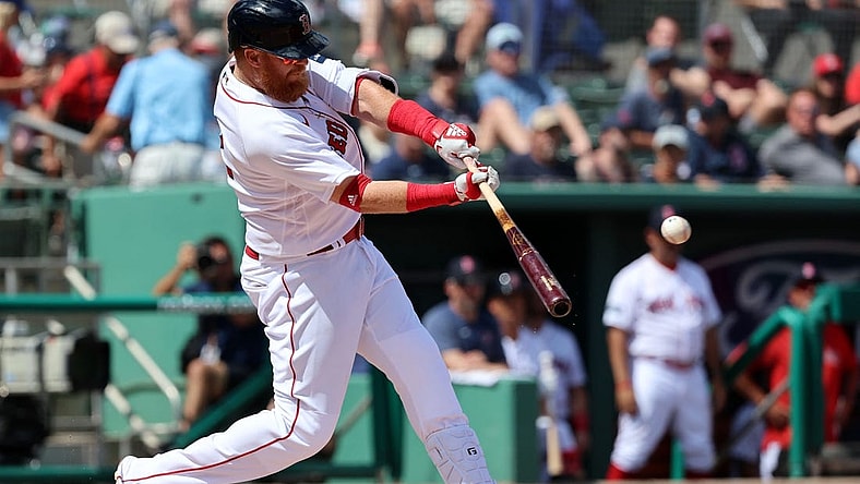 Mar 2, 2023; Fort Myers, Florida, USA;  Boston Red Sox third baseman Justin Turner (2) singles during the third inning against the Philadelphia Phillies at JetBlue Park at Fenway South. Mandatory Credit: Kim Klement-USA TODAY Sports