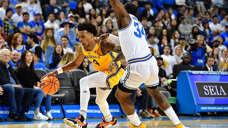 Mar 2, 2023; Los Angeles, California, USA; Arizona State Sun Devils guard Desmond Cambridge Jr. (4) moves to the basket against UCLA Bruins guard David Singleton (34) during the first half at Pauley Pavilion. Mandatory Credit: Gary A. Vasquez-USA TODAY Sports