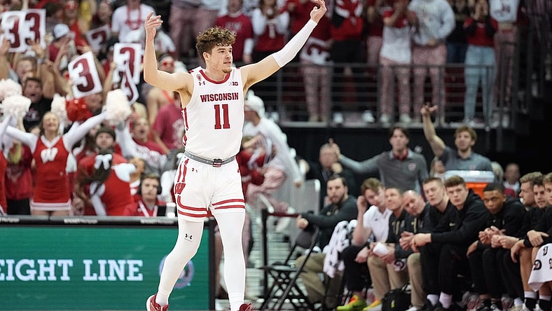 Mar 2, 2023; Madison, Wisconsin, USA; Wisconsin Badgers guard Max Klesmit (11) celebrates a three-pointer during the second half against the Purdue Boilermakers at the Kohl Center. Mandatory Credit: Kayla Wolf-USA TODAY Sports