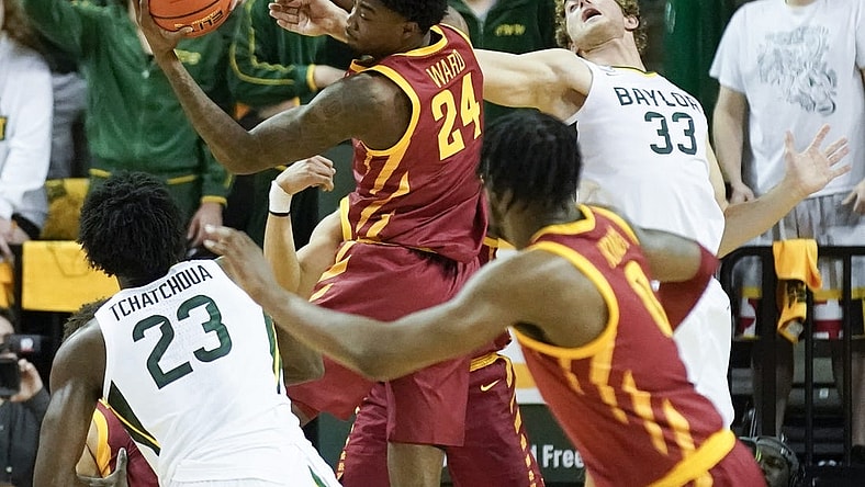 Mar 4, 2023; Waco, Texas, USA; Iowa State Cyclones forward Hason Ward (24) grabs the rebound in front of Baylor Bears forward Caleb Lohner (33) during the first half at Ferrell Center. Mandatory Credit: Raymond Carlin III-USA TODAY Sports
