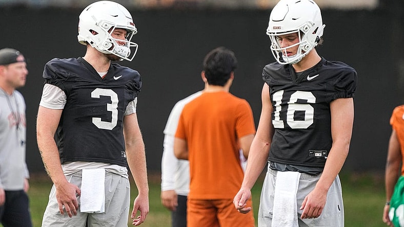 Quarterbacks Quinn Ewers (3) and Arch Manning (16) talk during the first Texas Longhorns football practice of 2023 at the Frank Denius Fields on the University of Texas at Austin campus on Monday, March 6, 2023.

Aem Texfoot First 2023 Practice 14
