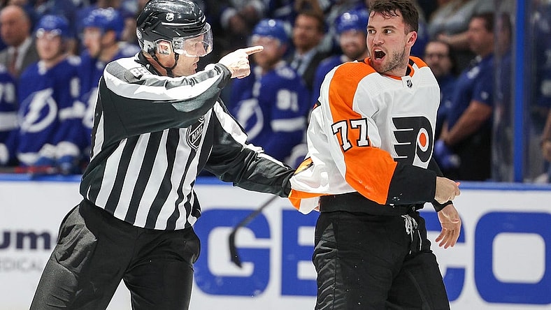 Mar 7, 2023; Tampa, Florida, USA;  Philadelphia Flyers defenseman Tony DeAngelo (77) reacts after a penalty during a game against the Tampa Bay Lightning in the third period at Amalie Arena. Mandatory Credit: Nathan Ray Seebeck-USA TODAY Sports