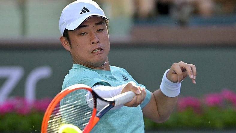 Mar 8, 2023; Indian Wells, CA, USA;  Yibing Wu (CHN) hits a shot during his first round match against Jaume Munar (not pictured) at the BNP Paribas Open at the Indian Well Tennis Garden. Mandatory Credit: Jayne Kamin-Oncea-USA TODAY Sports